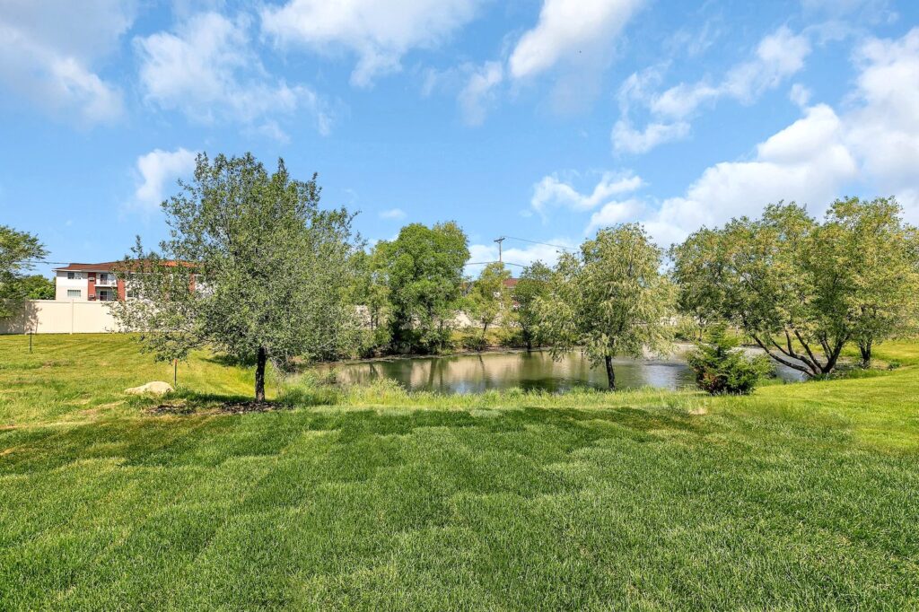 Watercress lot with pond and trees